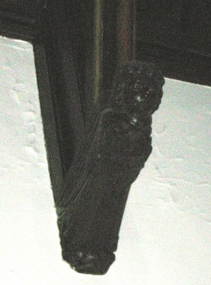 Angel on left